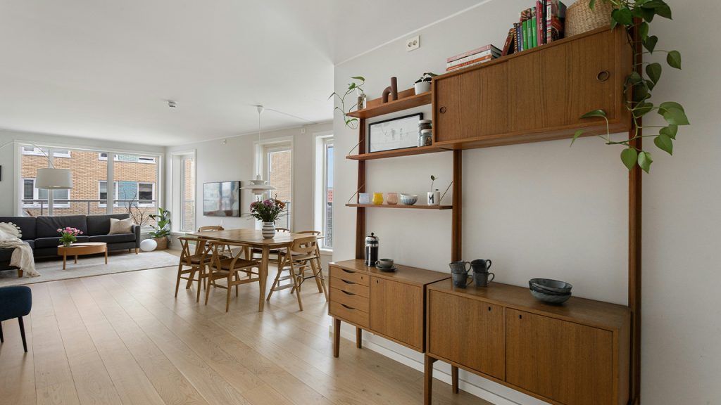 A living room filled with furniture and a large window