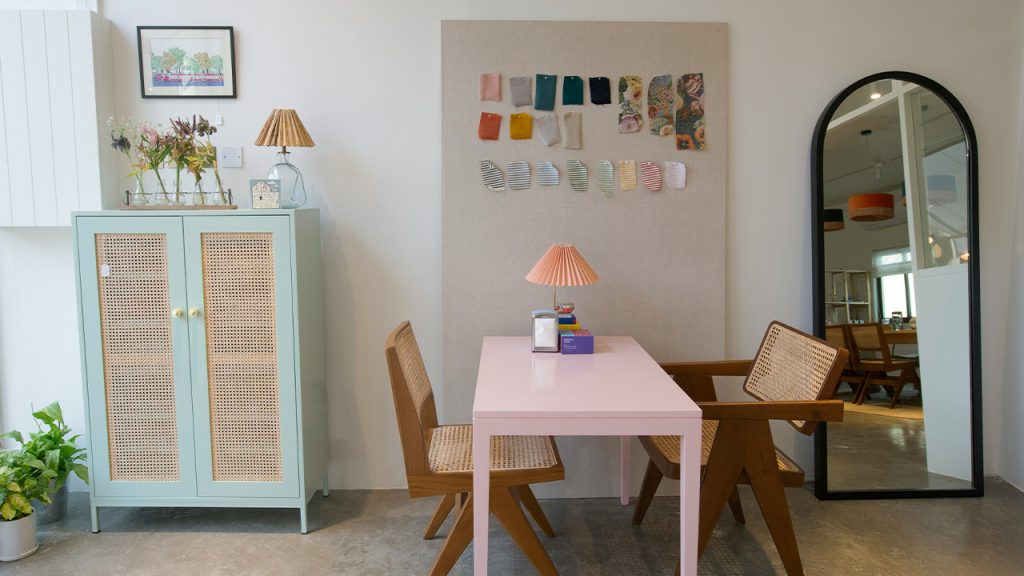 a room with a table and chairs