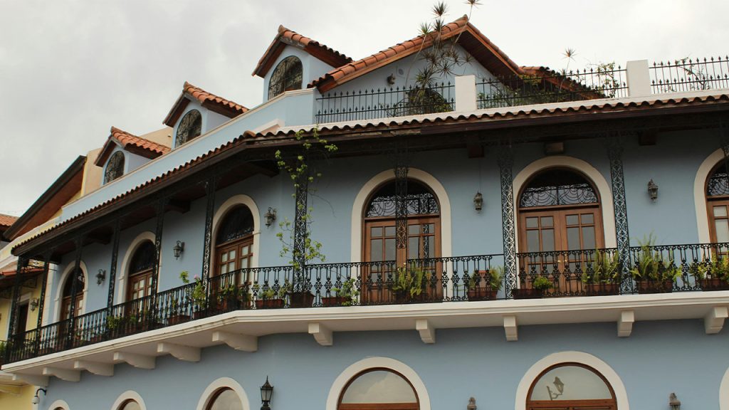 A House with Arched Windows and Balcony
