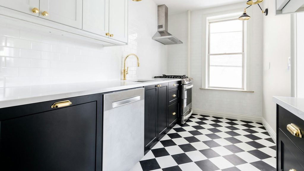 white wooden door near white wooden kitchen cabinet