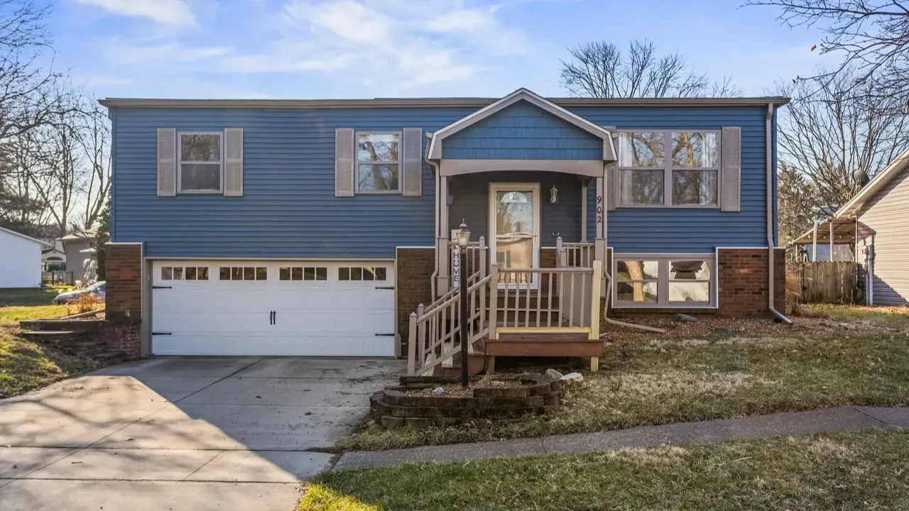 1978 Bi-Level Mahomet Residence With Remodeled Primary Suite and Wet Bar Lounge (With Floor Plan).
