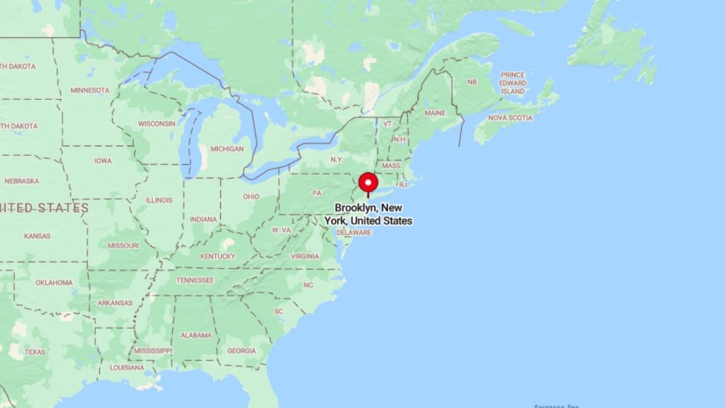 Elegant brick home with balconies in Brooklyn, New York.