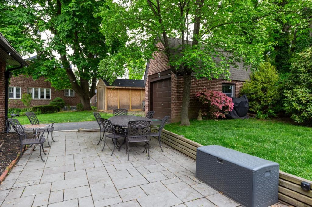 Charming Patio with Lush Landscaping