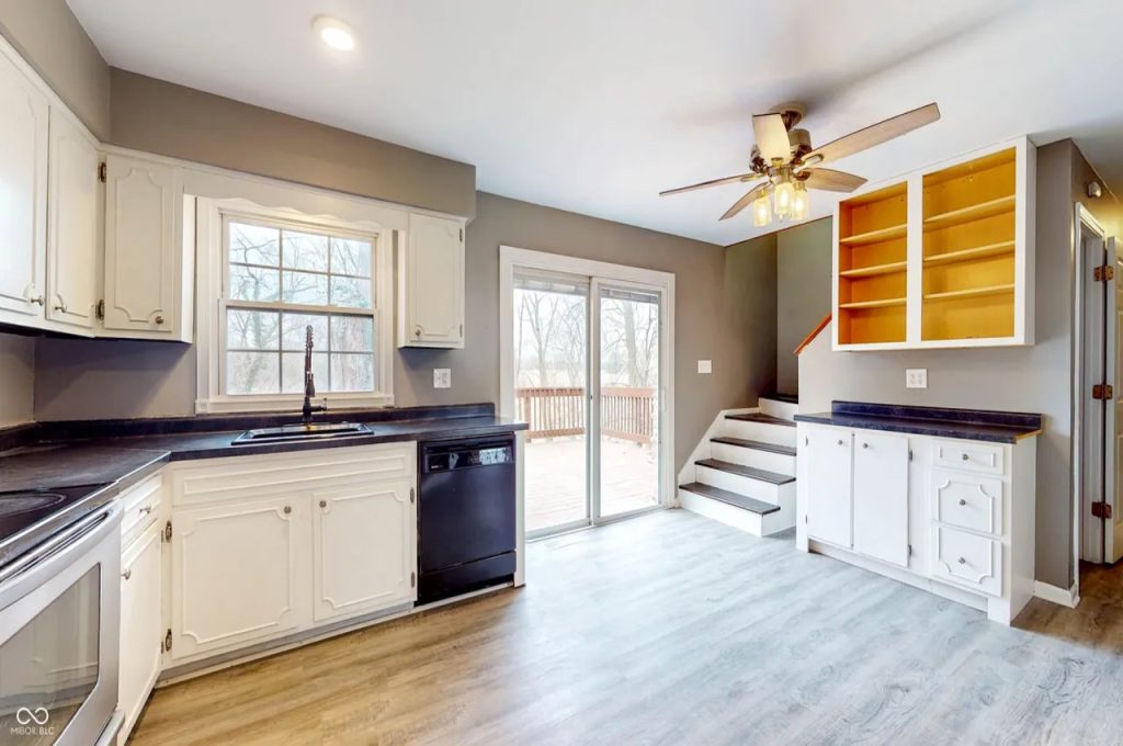 Kitchen with Staircase to Upstairs