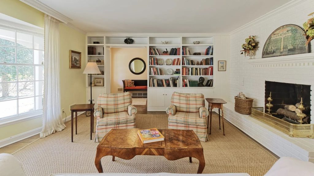 Living Room with Fireplace & Bookshelves