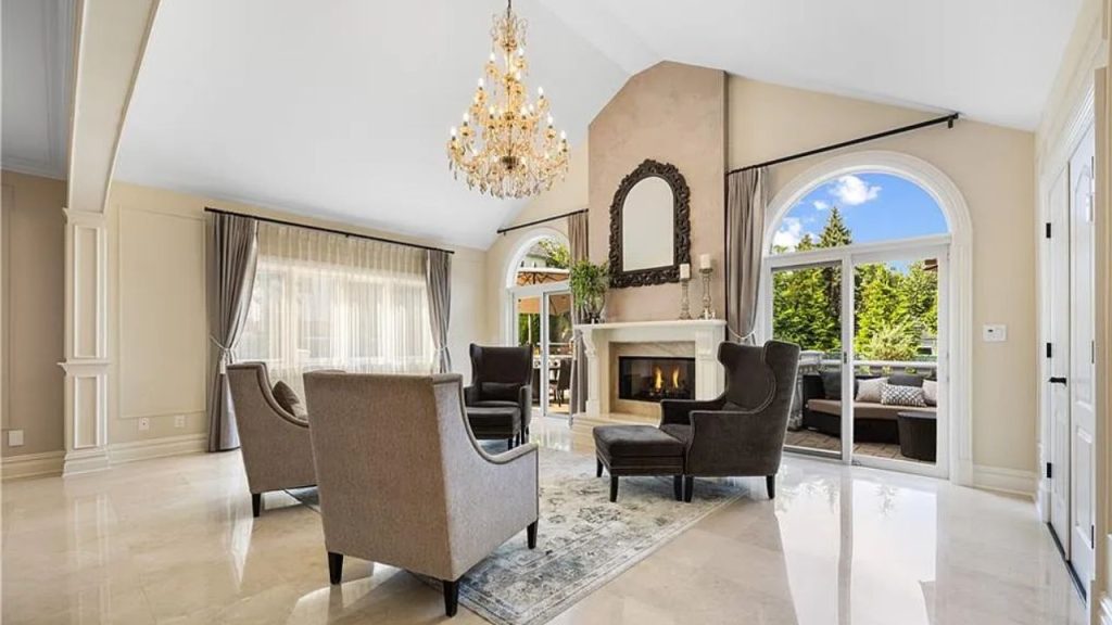 Stylish Living Room with Fireplace & Chandelier