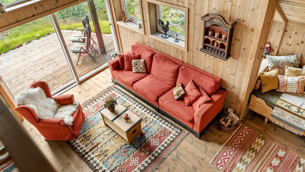 A living room filled with furniture and lots of windows