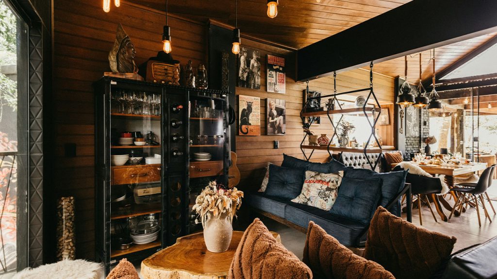 A living room filled with furniture and lots of windows