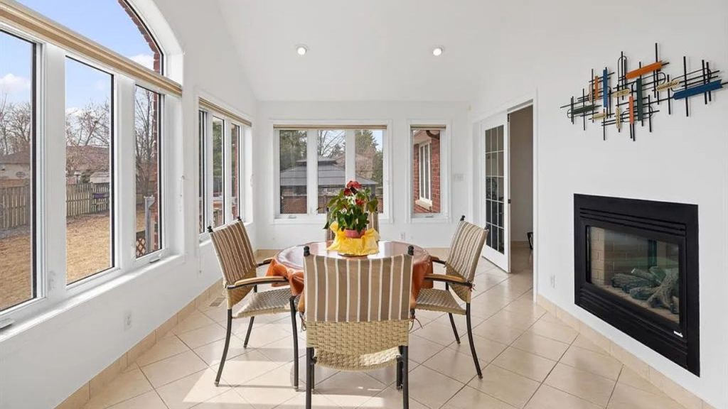 Sunlit Dining Room with Fireplace