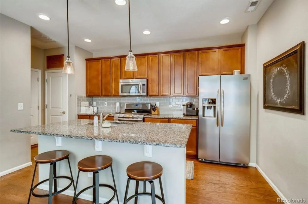 Modern Kitchen with Granite Island