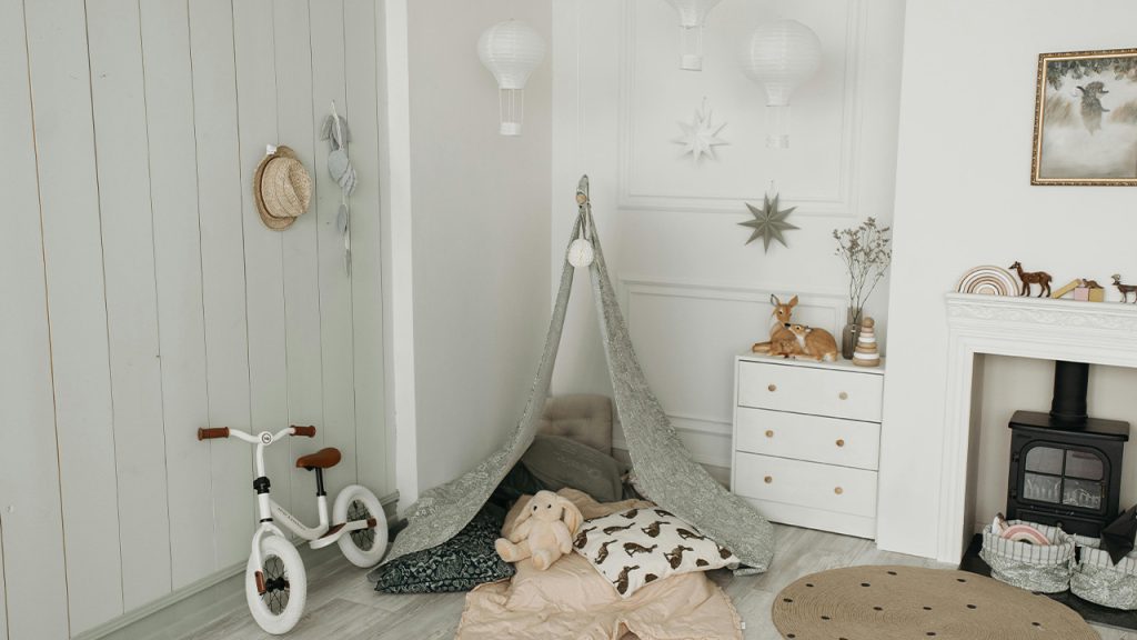 An Indoor Tent beside a White Bicycle