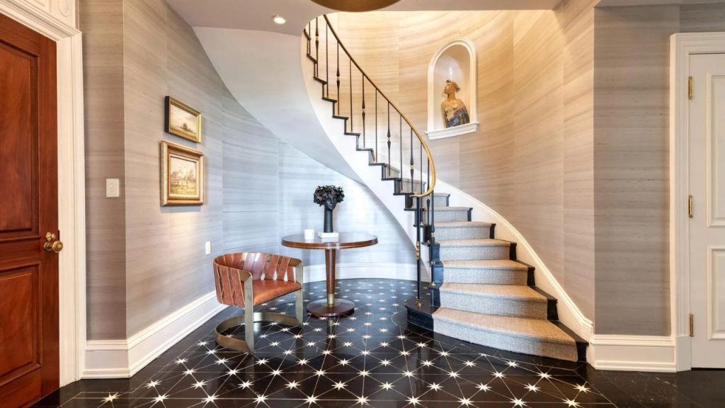 Elegant Entry with Curved Staircase