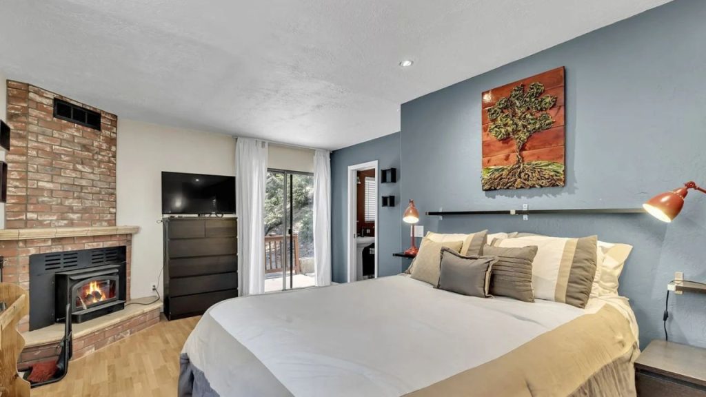 Cozy Bedroom with Fireplace & View