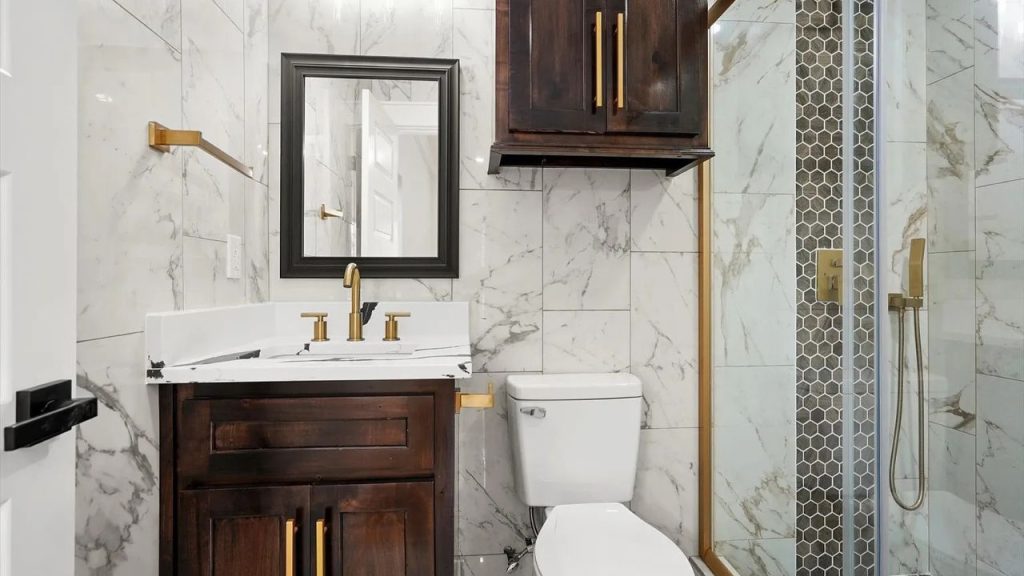 Marble Bathroom with Gold Accents