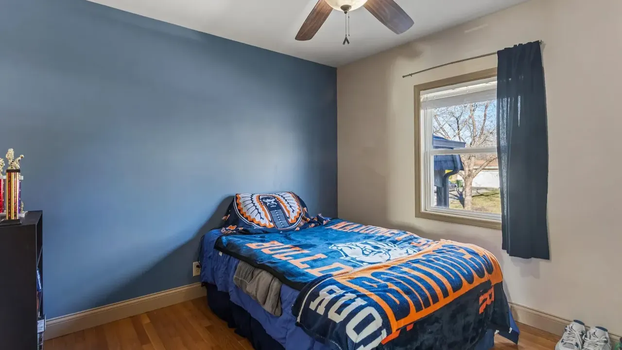 1978 Bi-Level Mahomet Residence With Remodeled Primary Suite and Wet Bar Lounge (With Floor Plan).