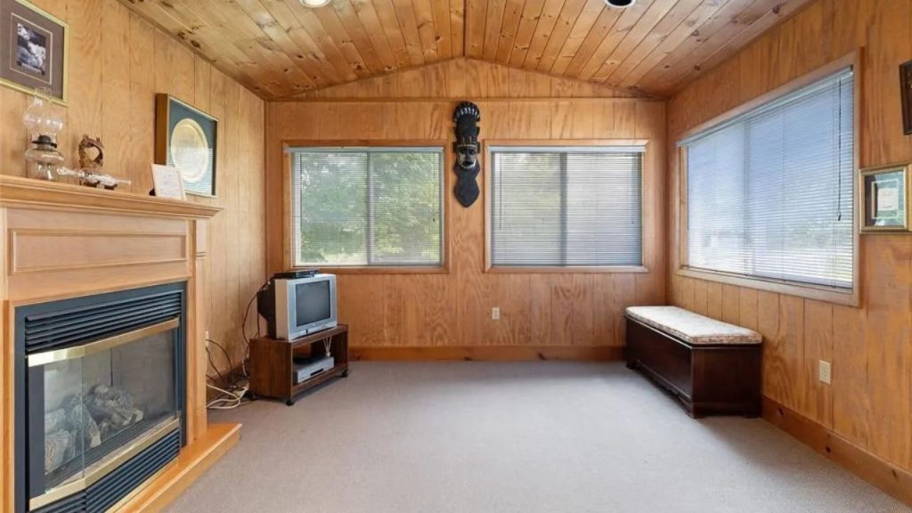 Cozy Sunroom with Fireplace Charm