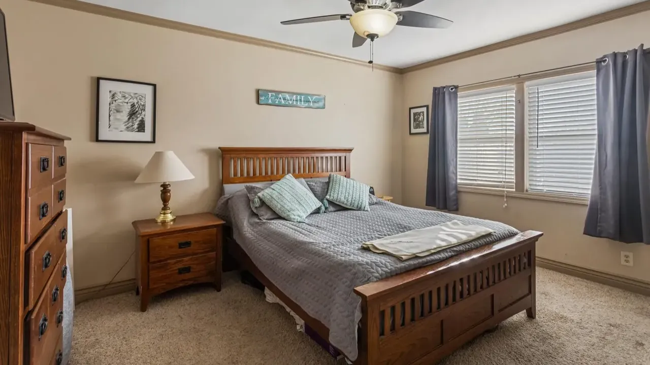 1978 Bi-Level Mahomet Residence With Remodeled Primary Suite and Wet Bar Lounge (With Floor Plan).