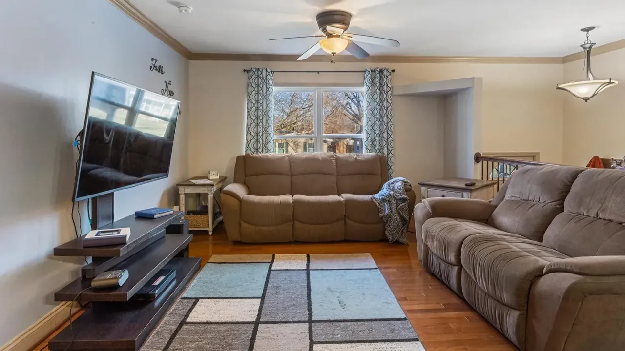 1978 Bi-Level Mahomet Residence With Remodeled Primary Suite and Wet Bar Lounge (With Floor Plan).