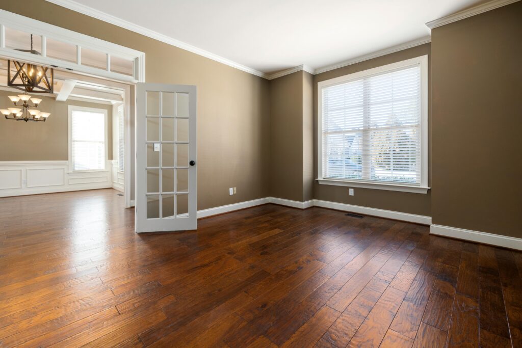 An interior with hardwood flooring.