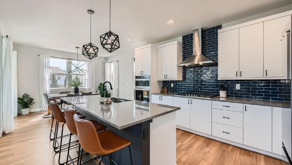 Chic 3-Bedroom FarmStyle Thornton Home with Covered Deck and High-End Kitchen Finishes (With Floor Plan)