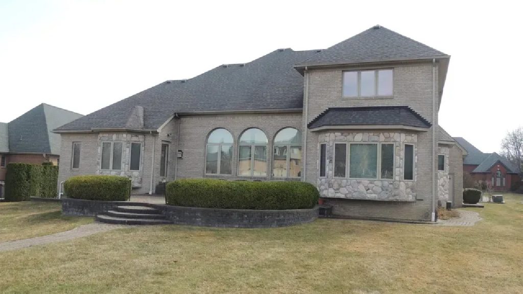 Elegant 6,173 Sq-Ft 4-Bedroom Split-Level with Island Kitchen and Finished Basement in Prestigious West Ridge (With Floor Plan)