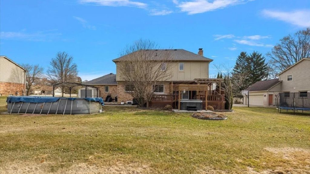 Spacious 3-Bedroom Colonial from 1987 with Quartz Kitchen and Finished Basement in Washington, MI (Floor Plan Inside)