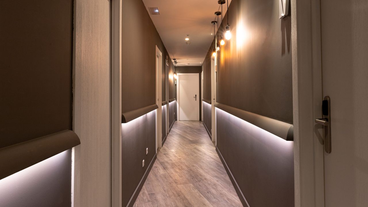 8 Ways to Make Dark Hallways Welcoming (Without Changing the Color)
