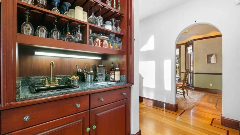 Get Inspired by This Grand 9,523 Sq-Ft Brick Manor in Fort Collins With Curved Staircase, Cherrywood Office, and Vaulted Ceilings