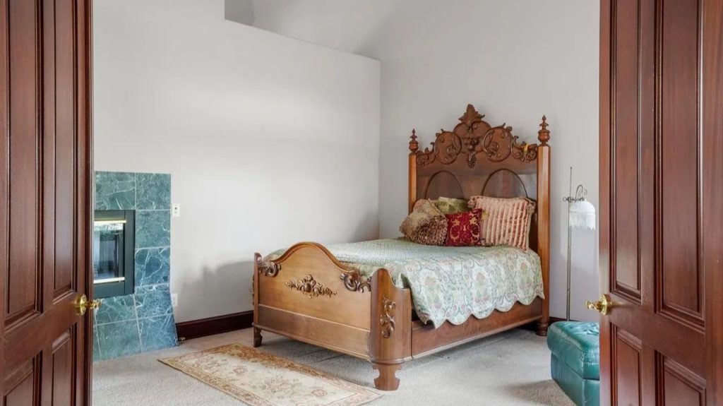 Get Inspired by This Grand 9,523 Sq-Ft Brick Manor in Fort Collins With Curved Staircase, Cherrywood Office, and Vaulted Ceilings