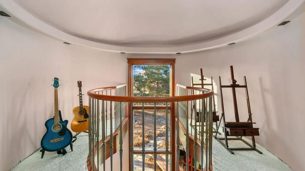 Get Inspired by This Grand 9,523 Sq-Ft Brick Manor in Fort Collins With Curved Staircase, Cherrywood Office, and Vaulted Ceilings