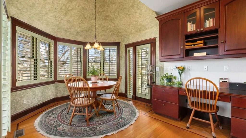 Get Inspired by This Grand 9,523 Sq-Ft Brick Manor in Fort Collins With Curved Staircase, Cherrywood Office, and Vaulted Ceilings