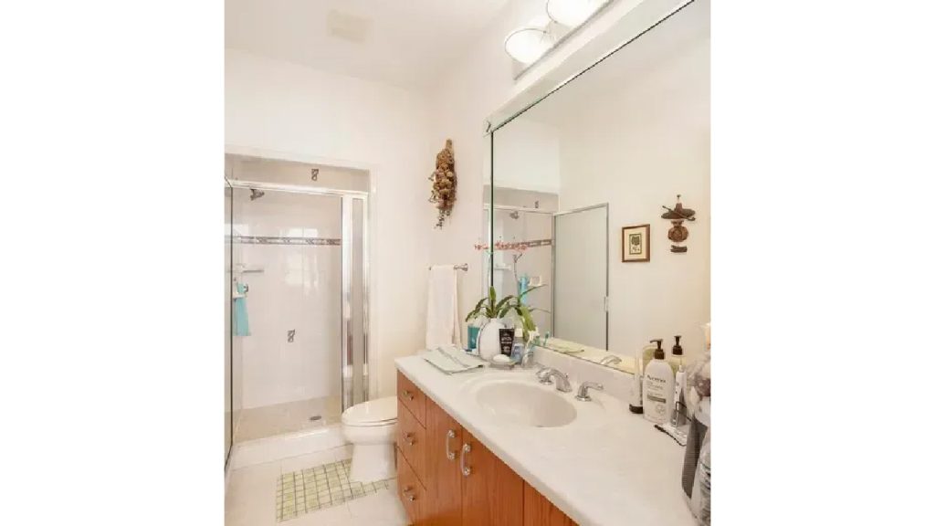 Elegant 6,173 Sq-Ft 4-Bedroom Split-Level with Island Kitchen and Finished Basement in Prestigious West Ridge (With Floor Plan)