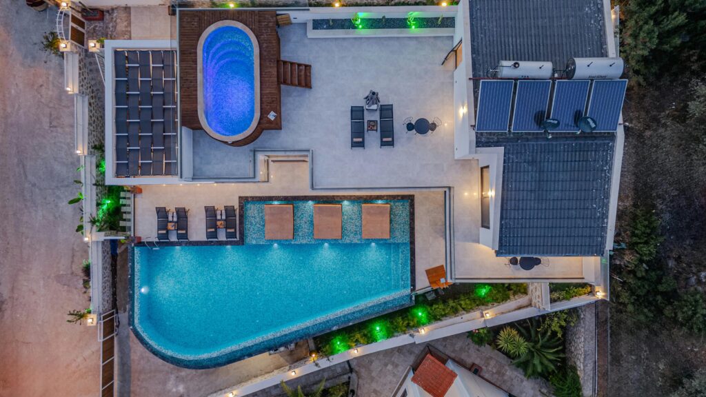Aerial view of two pools in a home.