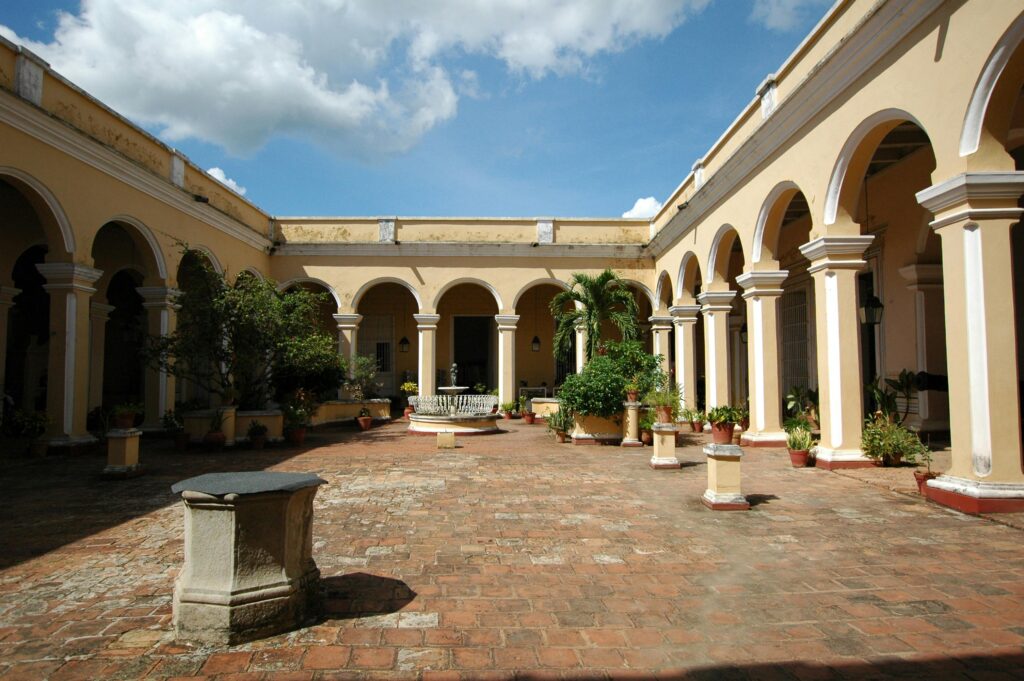 A Spanish courtyard surrounded by an arcade.