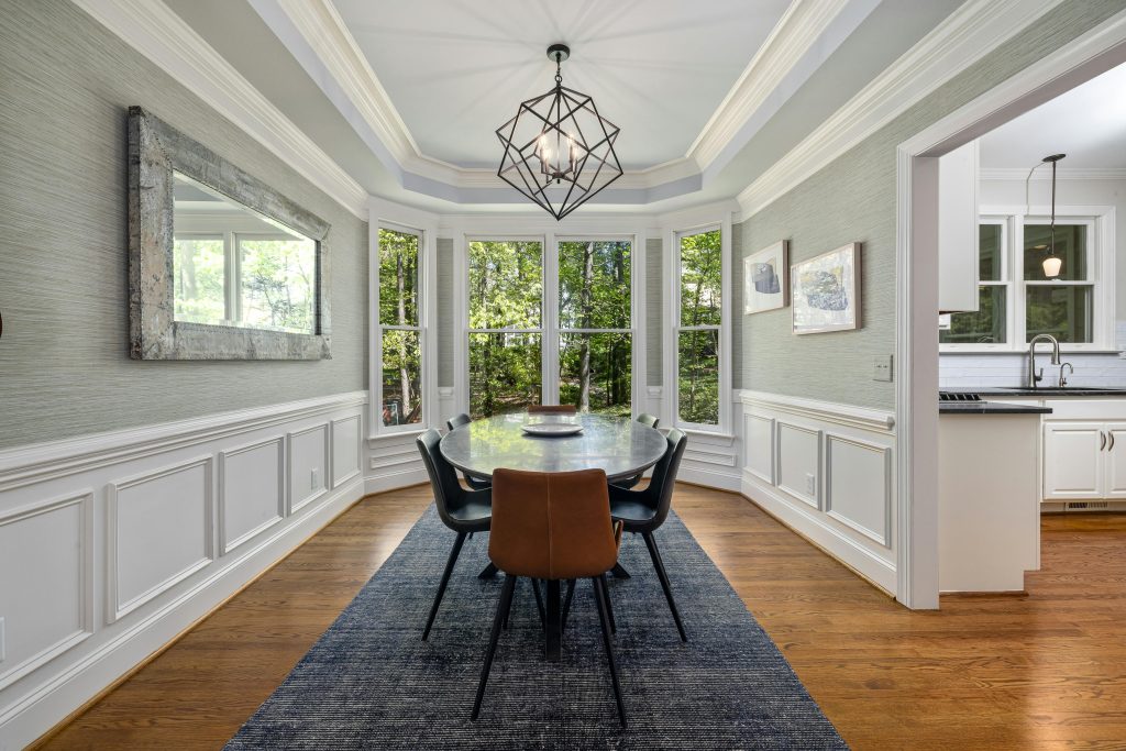 A dining room with wainscoting.