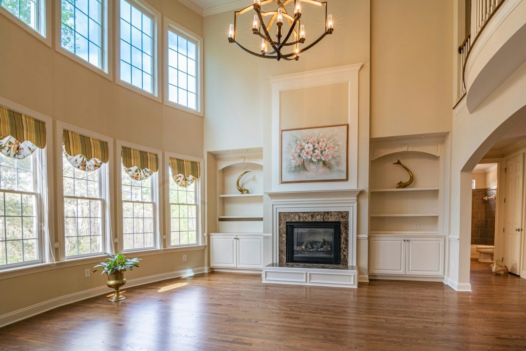 A large living room with transom windows.
