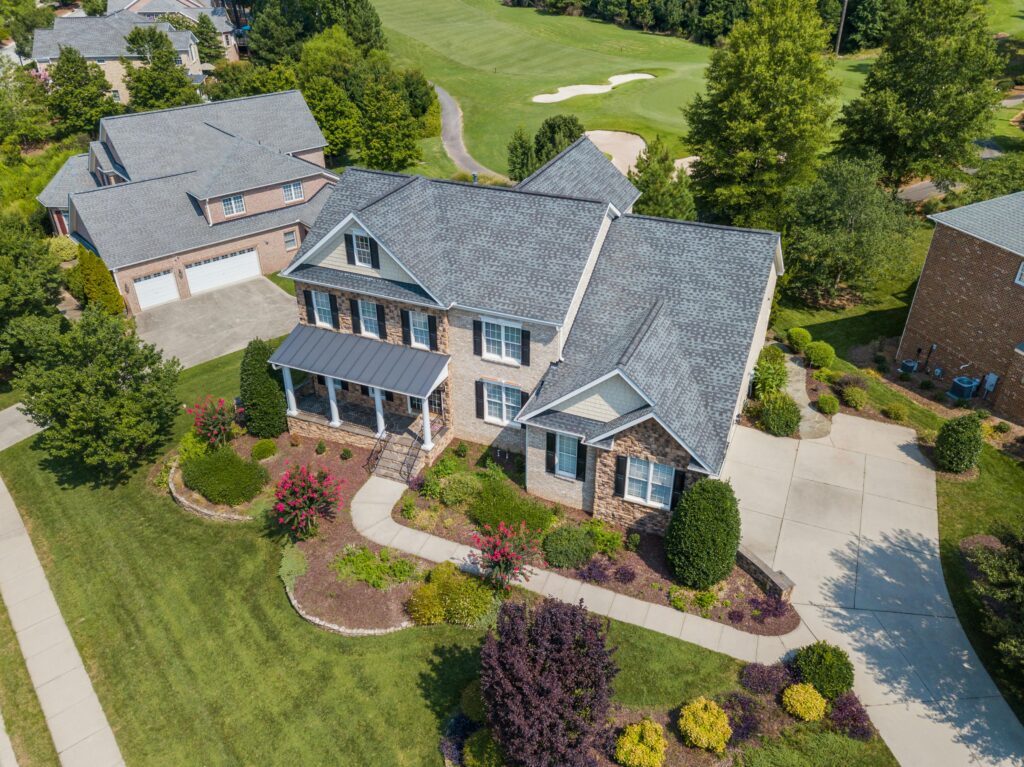 Curtis Adams / Pexels Aerial view of a house