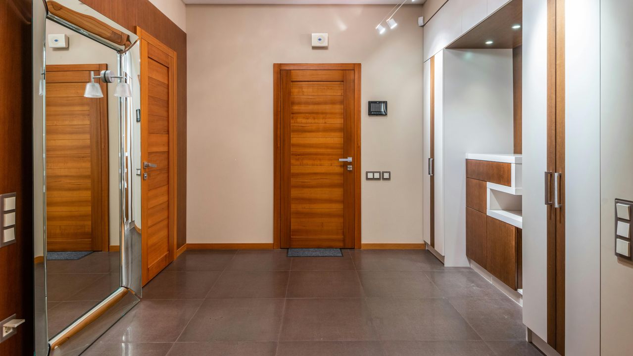 8 Ways to Make Dark Hallways Welcoming (Without Changing the Color)