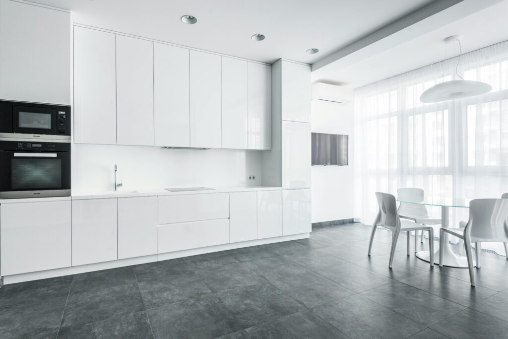 A white kitchen with slate tiles