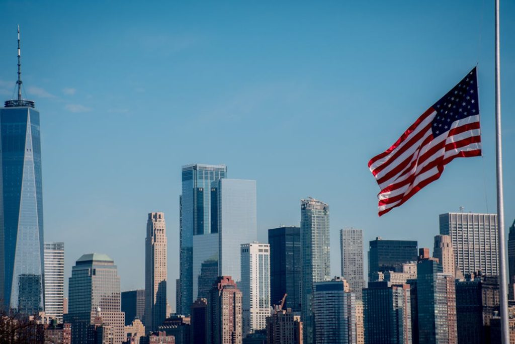 city skyline with flag