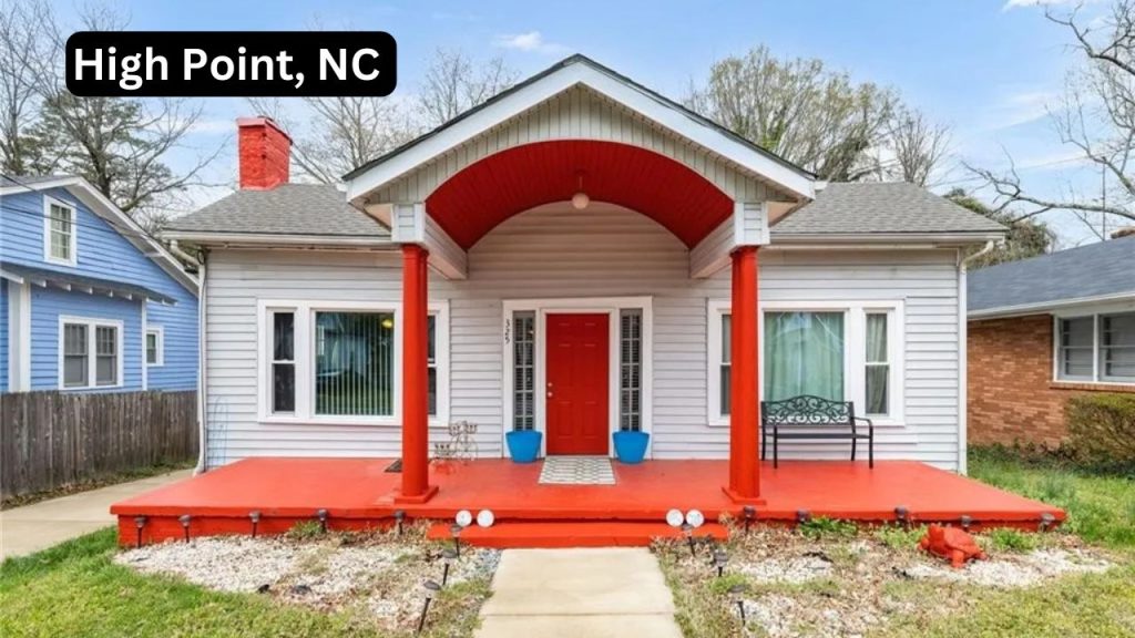 Single-family home with red porch columns and chimney in High Point, NC.
