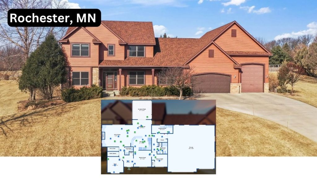 Large red-toned house with gabled roof and three-car garage in Rochester, MN.