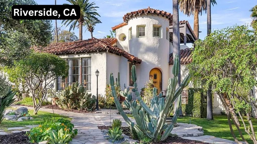 Spanish-style home with terracotta roof and cactus landscaping in Riverside.