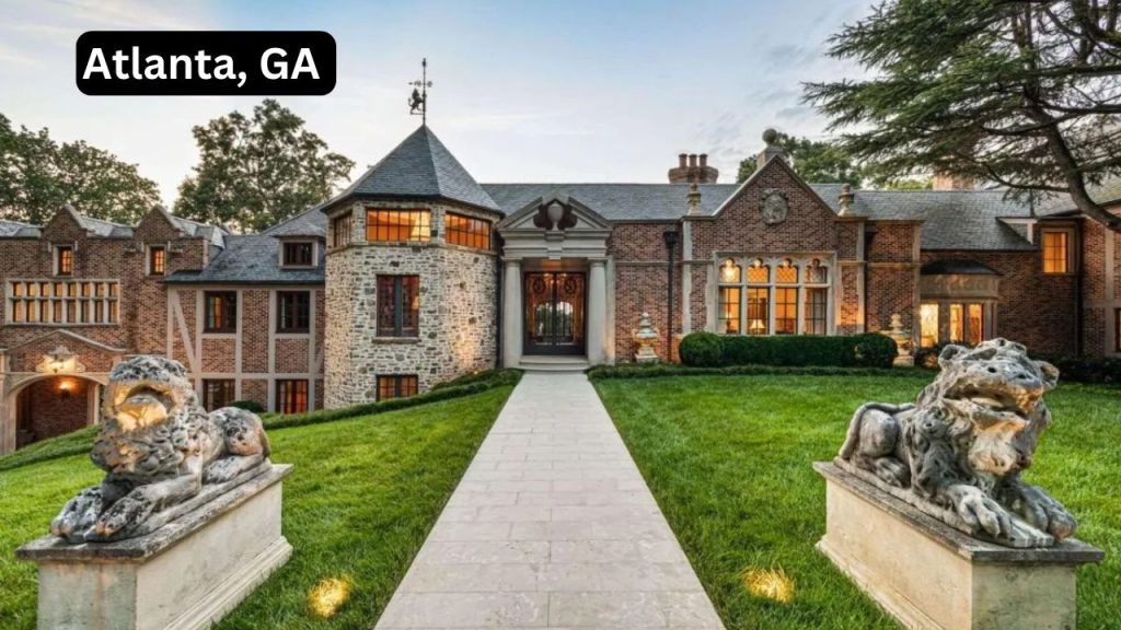Grand estate in Atlanta, GA, with brick and stone exterior, large front yard, and elegant entryway.