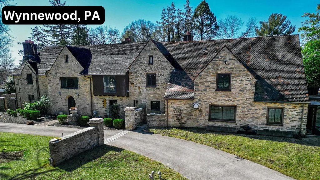 Stone manor-style home in Wynnewood, PA with large lot and classic charm.