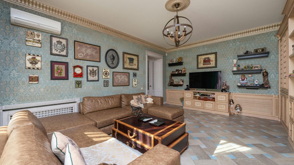 A Living Room With Beige Couch