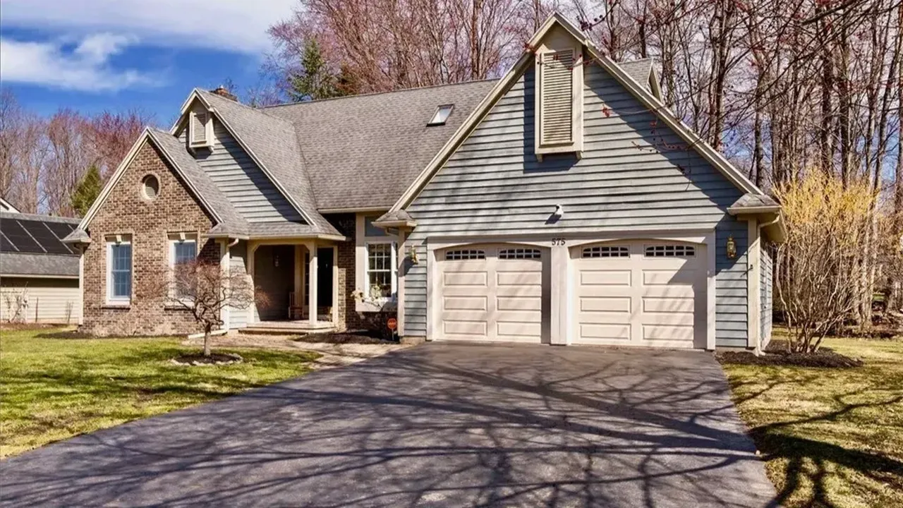 Discover this 1993 Contemporary Colonial With First Floor Office in Rochester, NY. (Floor Plan Inside)