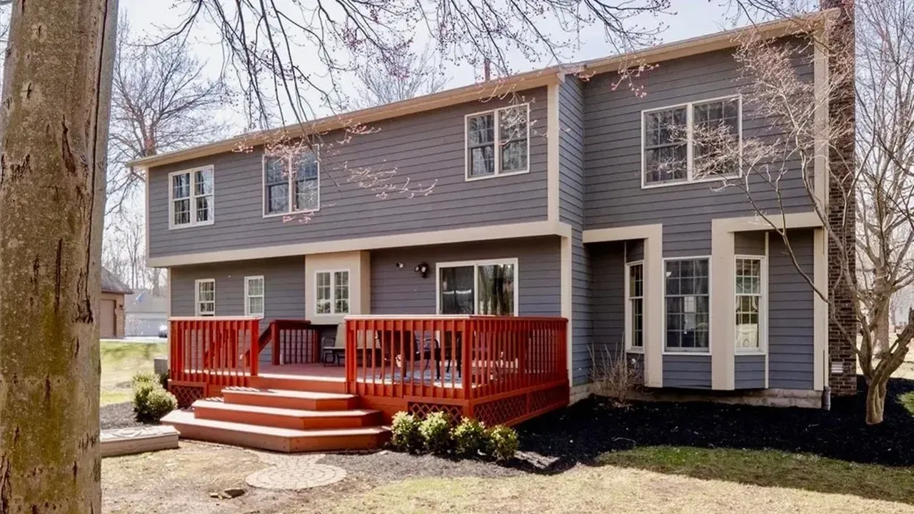 Discover this 1993 Contemporary Colonial With First Floor Office in Rochester, NY. (Floor Plan Inside)
