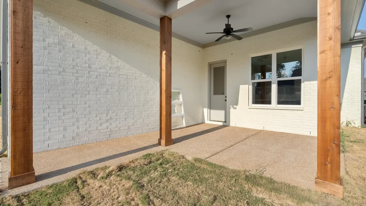 Discover a Modern Elevation Home with Gable Arch and Tongue-and-Groove Porch Ceiling in Hernando Mississippi (Floor Plan Included)