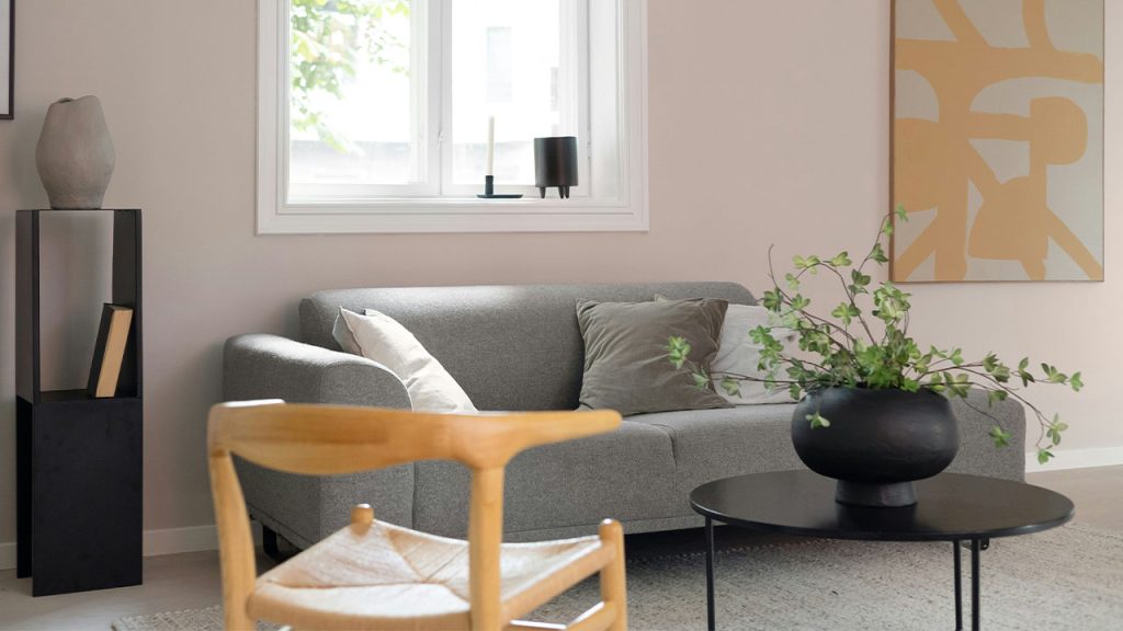 A living room filled with furniture and a window